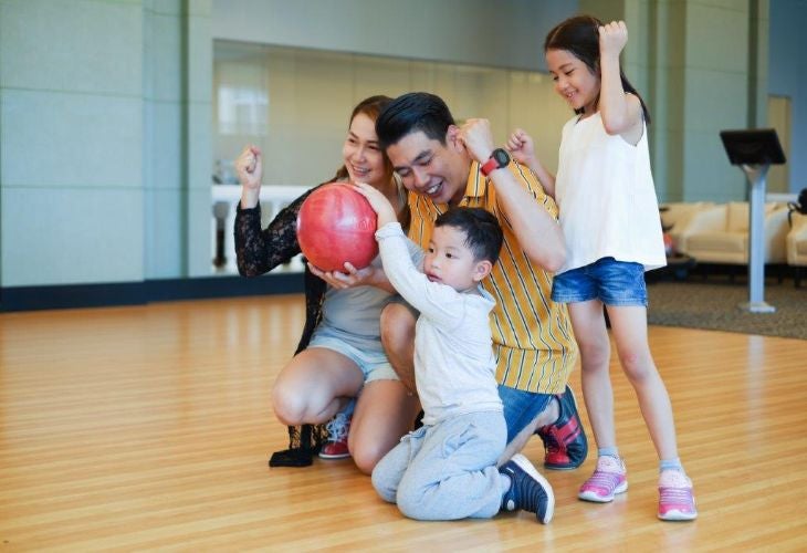 A family bowling together.